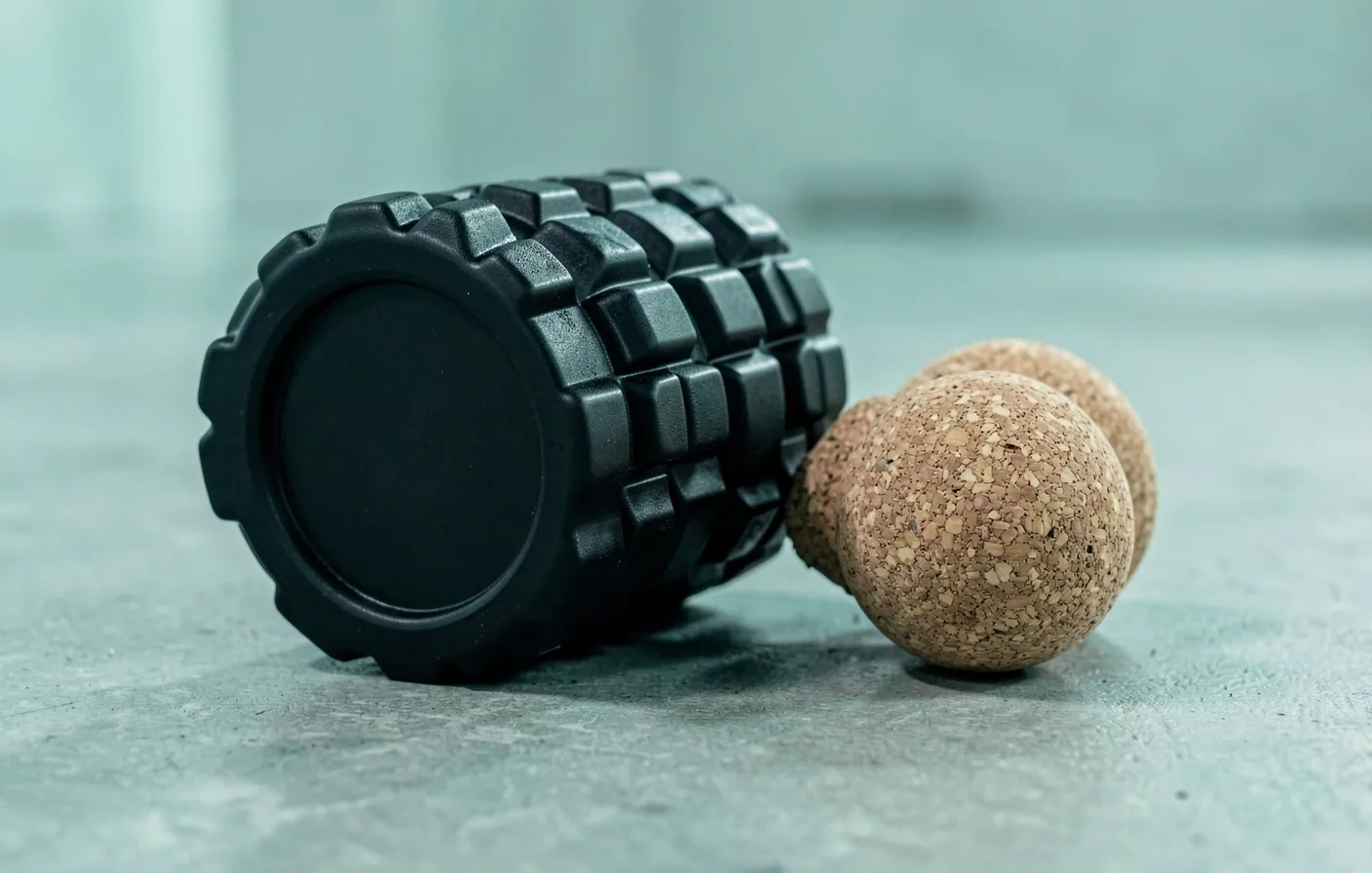 High-density foam roller on a studio floor